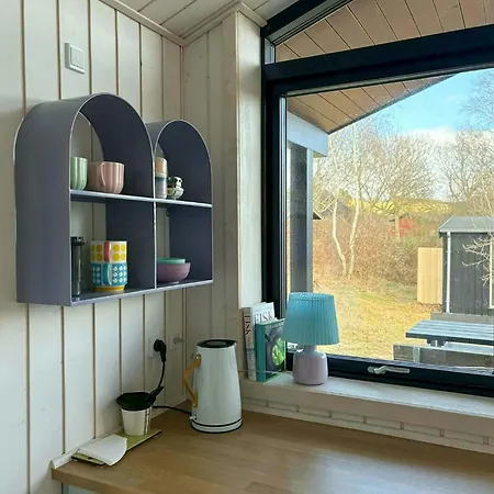Hébergement de vacances Moderne Traehus I Helgenaes' Bakkede Knebel