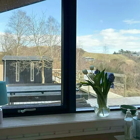 Holiday home Moderne Traehus I Helgenaes' Bakkede *