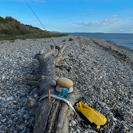 Moderne Traehus I Helgenaes' Bakkede Hébergement de vacances Knebel